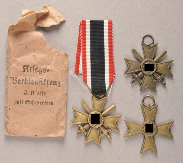 Germany (1933-1945)  Lot of 3 war merit crosses, 2nd class.  With or without swords; in addition a