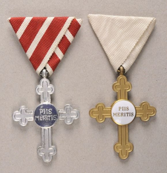 Collector Copies  Austria: Lot of 2 spiritual crosses of merit.  Sundry, each on ribbon.  Condition: