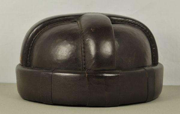 Italy  Pilots helmet, World War 1.  Brown leather helmet, brown liner, with chin strap, makers tag