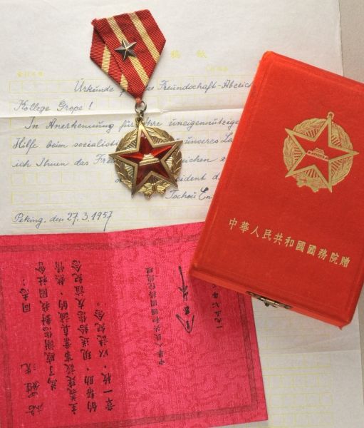 China  Friendship Medal, in box, with document and translation for the collegue Große.  Silver
