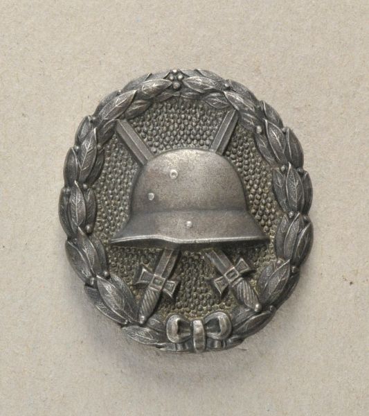 German Empire (1871-1918)  Wounded badge of the army, in black.  Iron blackened, hollow struck,