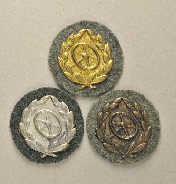 Germany (1933-1945)  Drivers provinency badge in gold, silver and bronce.  Each gilded, silvered and