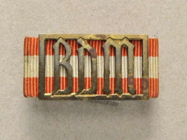 Germany (1933-1945)  BDM-profiniency badge, in bronce.  Brass, sewn in ribbon, hallmarked RZM M1/15,