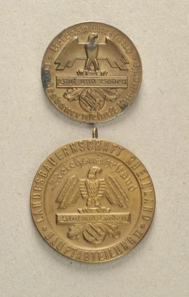 Germany (1933-1945)  Lot of 2 Reichsnährstand decorations.  1.) Landesbauernschaft Kurmarkt,