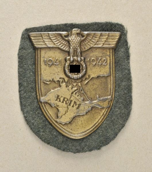 Germany (1933-1945)  Crimean-shield.  Iron bronced, with fabric, backing plate, only two prongs