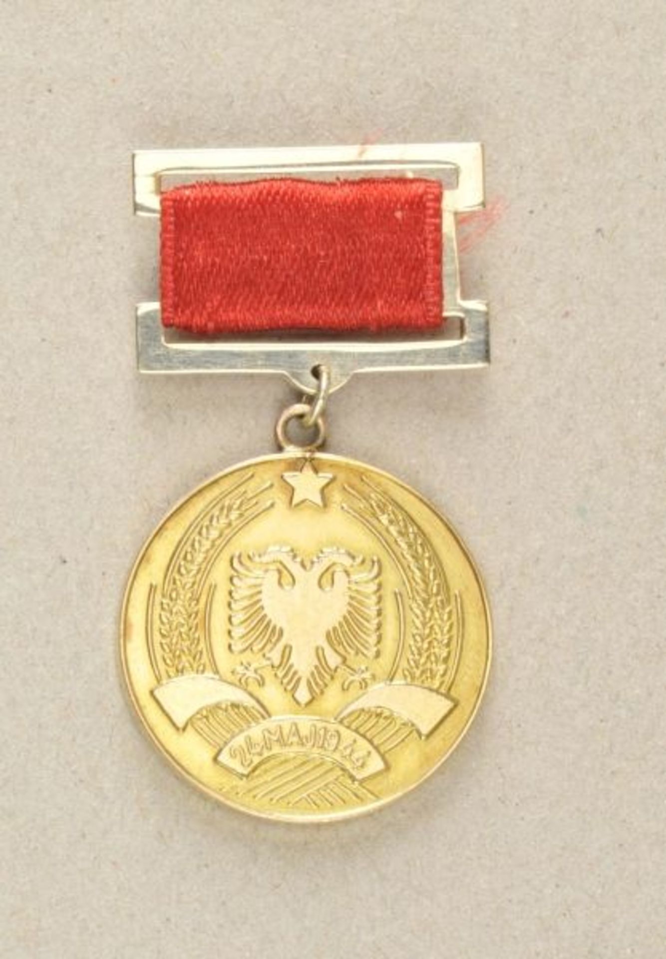 Albania  National prize, 1st class.  Gold, at wear clasp with ribbon. Average 26mm, 22,4g m.B.