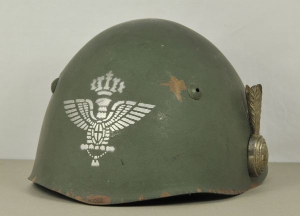 Italy  Parade helmet, M33, for generals.  Leather helmet, green painted, bush holder silvered and