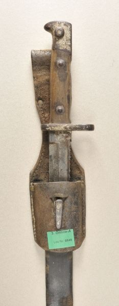 Prussia  Bajonet with saw back.  Blade with several hallmarks, among them 07, saw back, in scabbard,