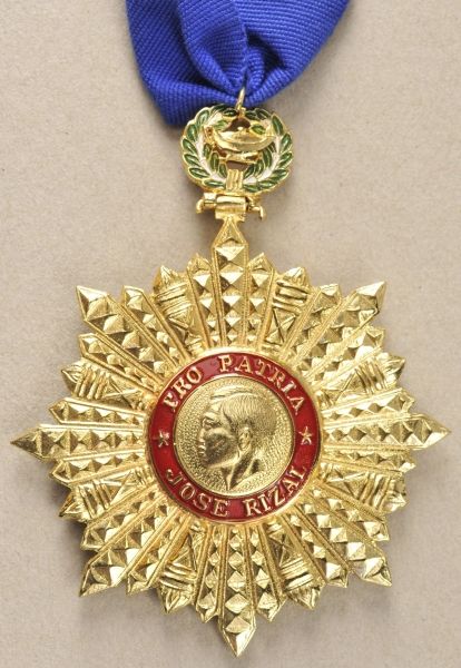 Philippinines  Order Jose Rizal.  Gilded, laquered, on long neck ribbon.  The order is awarded in