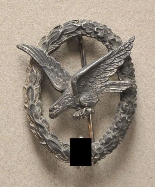 Germany (1933-1945)  Gunners Badge, without lighning bolts.  Zinc, eagle twice riveted.