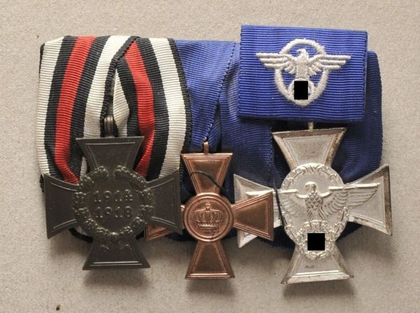 Germany (1933-1945)  Mounted medalbar of a police officer with 3 decorations.  1.) Honor Cross for