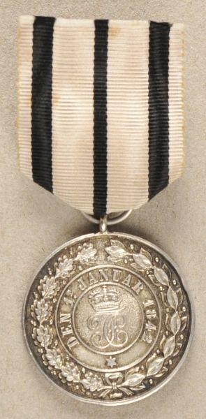 Hohenzollern  Ducal House Order of Hohenzollern, silver merit medal.  Silver, on ribbon.  Condition: