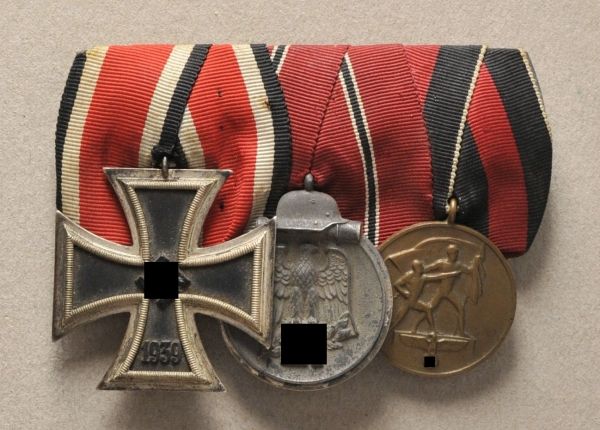 Germany (1933-1945)  Large medalbar with 3 decorations.  1.) Iron Cross, 1939, 2. class; 2.) Eastern