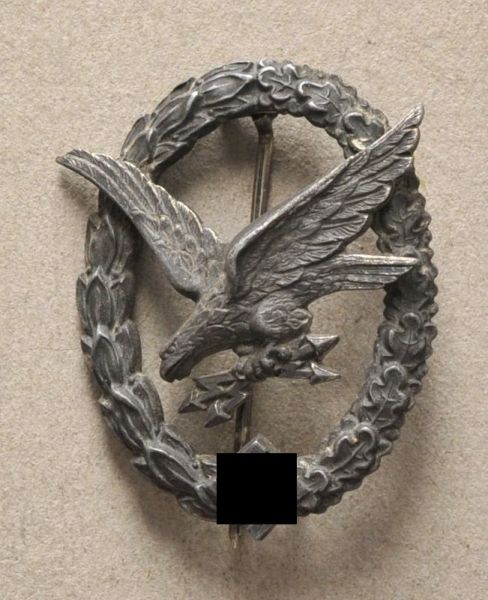 Germany (1933-1945)  Gunners BAdge, with lightning bolts.  Zinc, eagle twice riveted, W. DEUMER