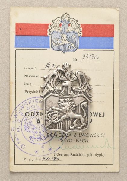 Poland  Badge of the 6. (Lion) Division with booklet for Kpr. Jan Matecki.  Silvered, on