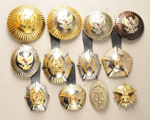 Indonesia  Lot of 12 proviniency badges.  Various.  Condition: II    Starting price: 100