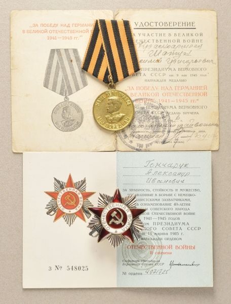 Sovjet Union  Lot of 3 decorations and documents.  1.) Order of the patriotic war, 3. model, no.