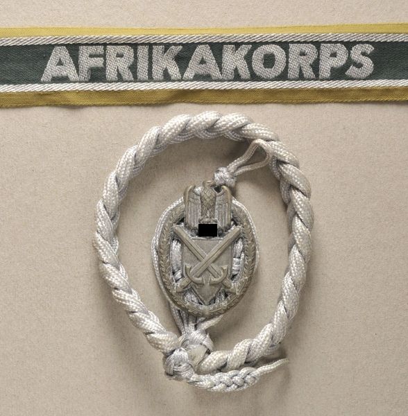 Army  Lot insignias.  1.) Linyard, Infantery, 2. model; 2.) cuff title "AFRIKAKORPS".  Condition: II