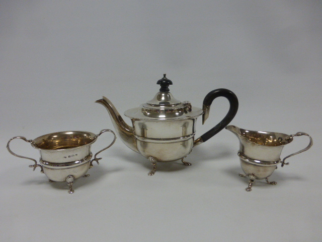 Three piece silver bachelor tea set, hallmarked Birmingham 1910/18, by maker William Devenport, on