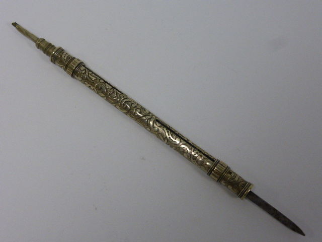 A late 19th/early 20th Century silver plated fully retractable combination pencil and pen/fruit