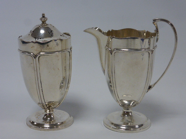 Silver cream jug and sugar caster for strawberries, on circular pedestal base, hallmarked Birmingham