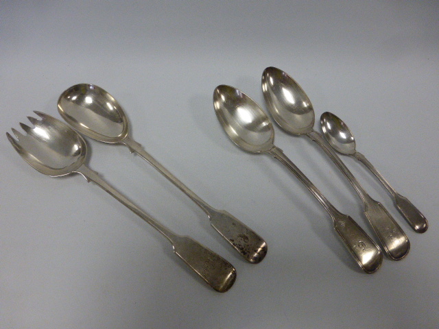 Pair of silver servers, hallmarked London 1924, by makers Wakely & Wheeler Ltd., 26cms in length,