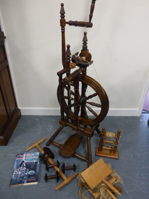 Scottish Spinning wheel from the Isle of Galloway, with accessories and reference book 'The Craft of