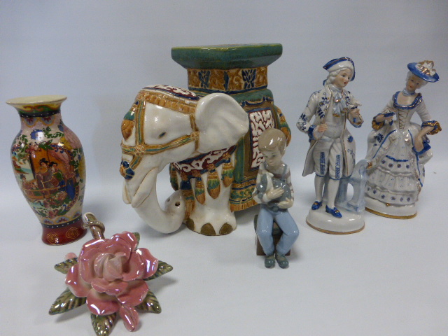 Ceramic elephant seat, Nao boy with puppy, two Continental figures, Satsuma vase and a lustre rose