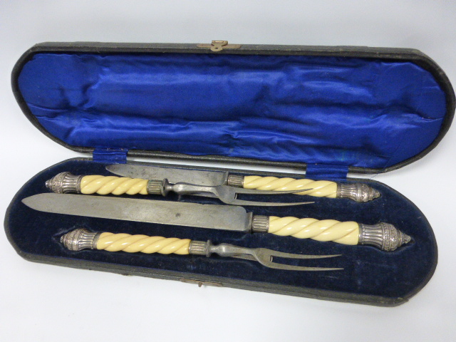 Victorian four piece carving set with carved rope twist Ivory handles and silver knops, hallmarked