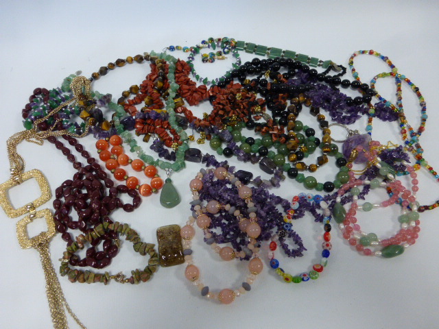 Collection of necklaces and bracelets to include Amethyst, Tiger`s Eye, polished stones and