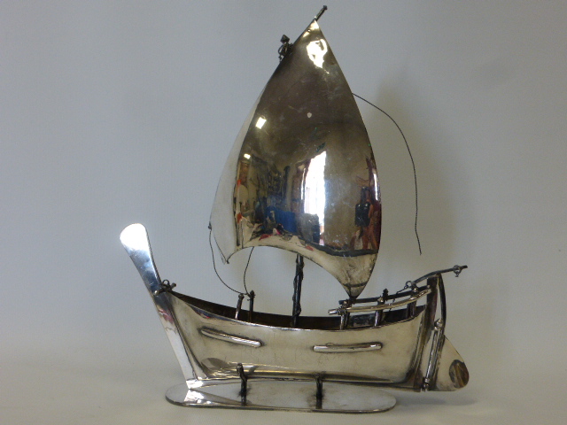 Continental White metal model of an Arab Dhow on stand, stamped by maker in Sharjah UAE, 1167g,