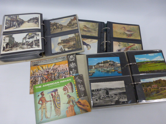 Three postcard albums containing British postcards, together with two Instant Picture Books No.9 &