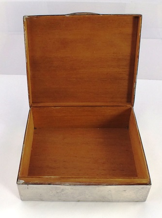 ** & CO AN OBLONG SILVER CIGARETTE BOX having engine turned domed hinged lid unengraved with timber - Image 3 of 4