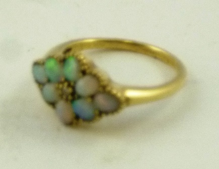 A VICTORIAN STYLE DIAMOND AND OPAL DRESS RING having central brilliant surrounded by eight oval - Image 2 of 2