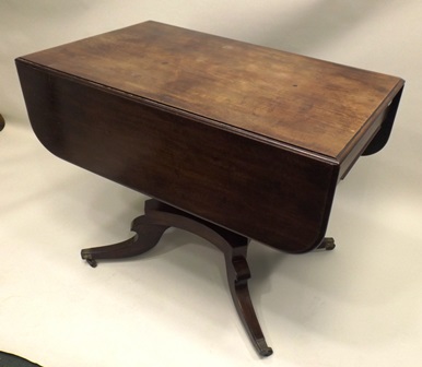 AN EARLY VICTORIAN MAHOGANY TABLE having drop flap top with moulded edge, mounted on a single - Image 3 of 3
