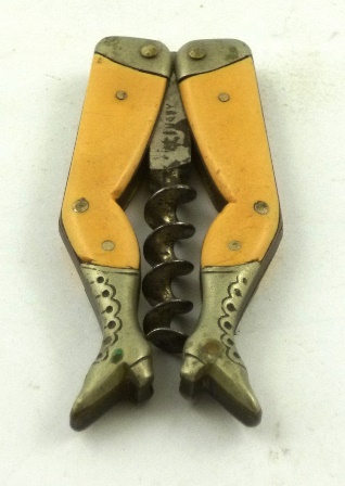 A GERMAN NOVELTY CORKSCREW fashioned as two booted lady`s legs