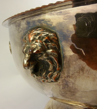 A MID 20th CENTURY ELECTRO-PLATE ON COPPER PUNCH BOWL having gadroon rim, lion mask and coin inset - Image 3 of 3