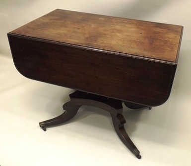 AN EARLY VICTORIAN MAHOGANY TABLE having drop flap top with moulded edge, mounted on a single - Image 2 of 3