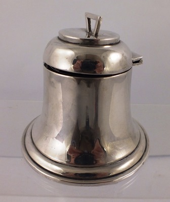 A.J. ZIMMERMAN & SONS A SILVER INKWELL fashioned as a bell, having hinged lid with angular handle,