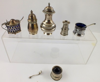 A MISCELLANY OF FIVE SILVER CONDIMENTS including mustard, pepperettes, ink well and three salt