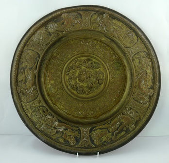 A VICTORIAN ELKINGTON BRASS ELECTRO FORMED CHARGER depicting reclining classical females and `