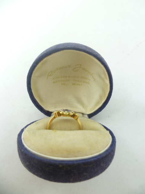 A VICTORIAN SAPPHIRE AND SEED PEARL DRESS RING with central sapphire and ten seeds in gold setting,