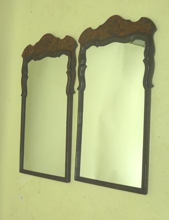 A PAIR OF EARLY 20TH CENTURY WALNUT VENEERED AND MARQUETRY INLAID WALL MIRRORS, each having shaped