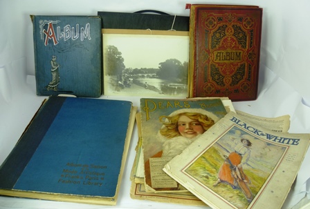 TWO EARLY 20TH CENTURY SCRAP ALBUMS, one containing colour prints, the other half full in