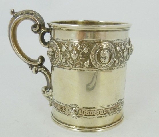 JOHN RUSSELL A VICTORIAN SILVER CYLINDRICAL MUG  having ornate banded mask and floral banded