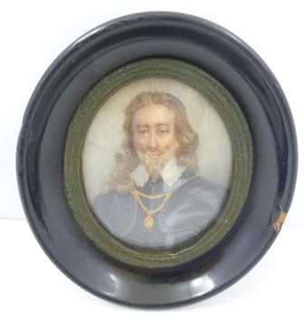 20TH CENTURY SCHOOL A miniature portrait head and shoulders of Charles I, portrayed smiling in blue