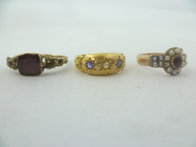 A SELECTION OF THREE VICTORIAN AND EARLY 20TH CENTURY DRESS RINGS set with sapphires, seed pearls,