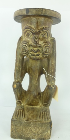 AN AFRICAN CARVED TRIBAL FIGURE fashioned as a stool