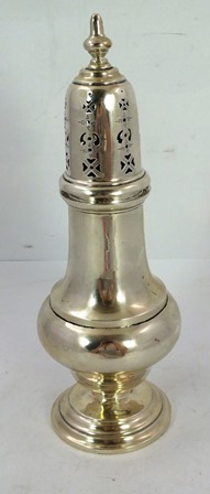 V or W** N** A GEORGIAN STYLE SILVER SUGAR DREDGER, having push fit lid, upon a plain spun baluster