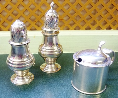 J.B. CHATTERLEY & SONS A GEORGIAN STYLE SILVER SALT AND PEPPER, each having chequer etched push fit